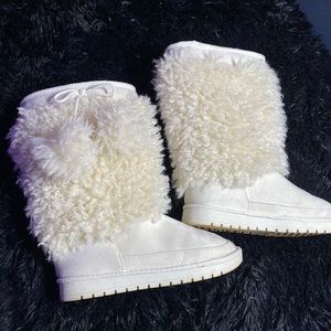 Fluffy cream colored suede boots with fuzzy tops